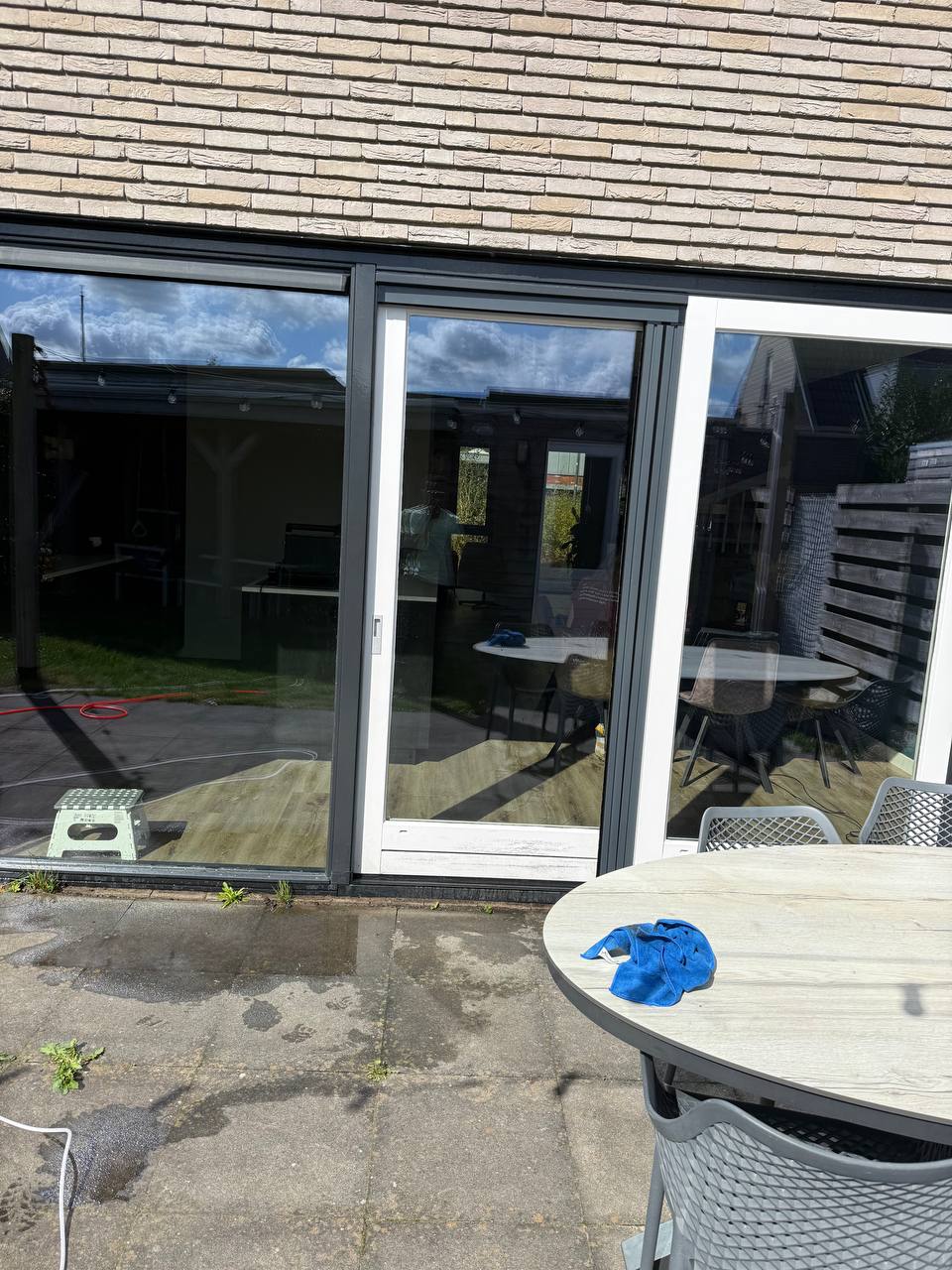 Schuifpui en glasdeuren gereinigd met osmosewater