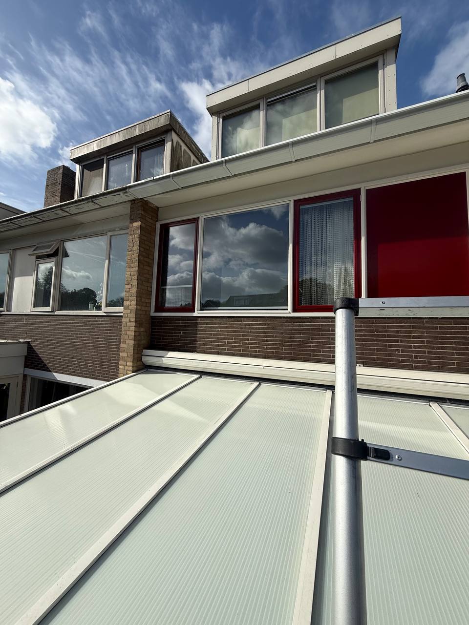 Overkapping en serre gereinigd met osmosewater